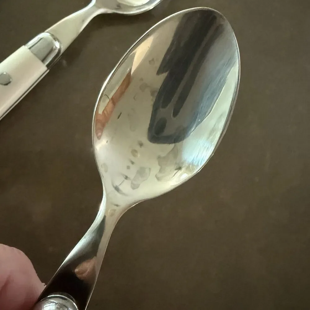 Four (4) teaspoons - Stainless Steel Plastic Ivory/White Similar to JUBILEE